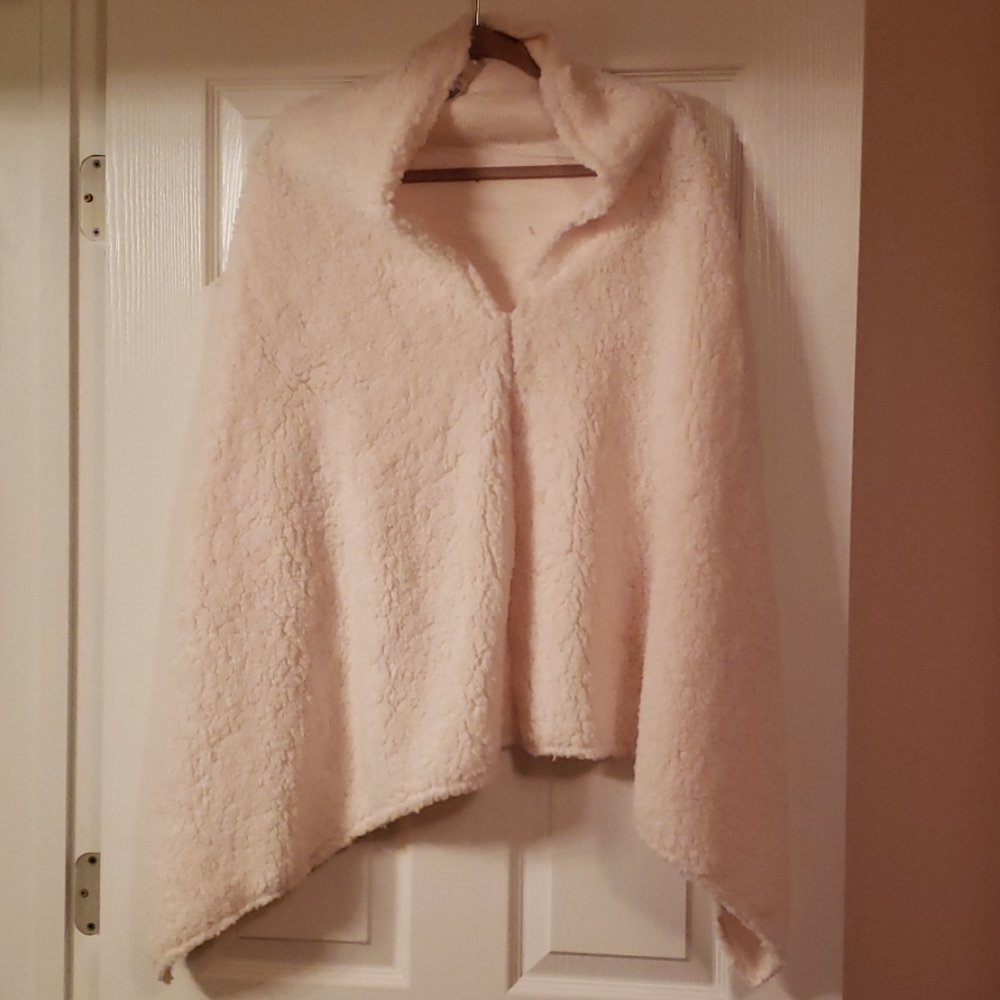 Cream poncho.